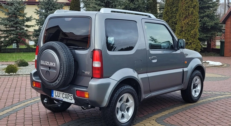 Suzuki Jimny cena 32900 przebieg: 146000, rok produkcji 2006 z Międzyzdroje małe 704
